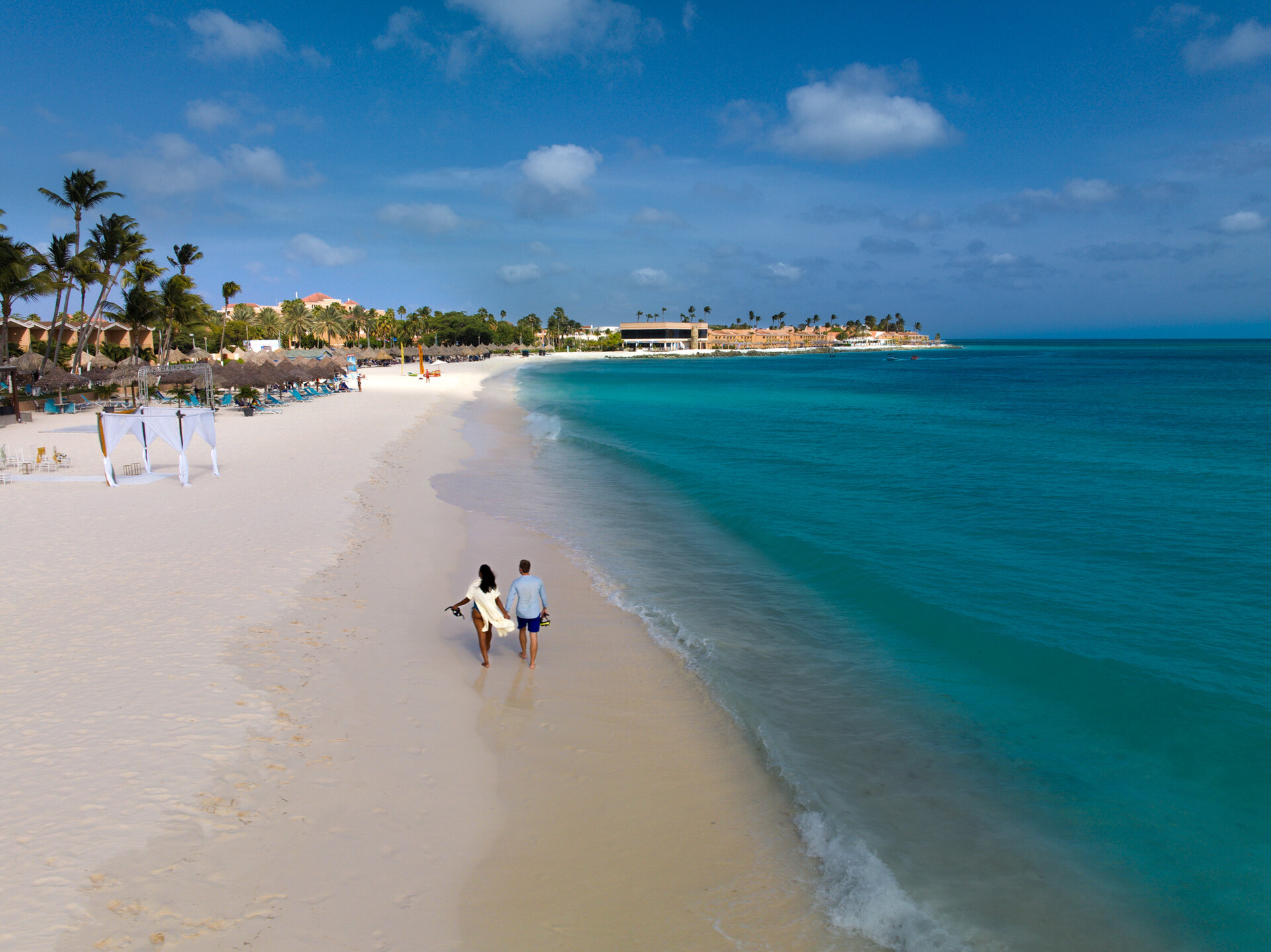 Couple walking on the beach