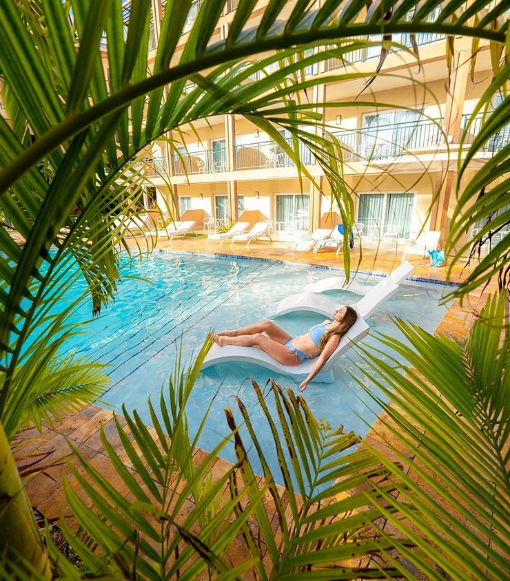 Ellie Smart Relaxing by the Divi Pool